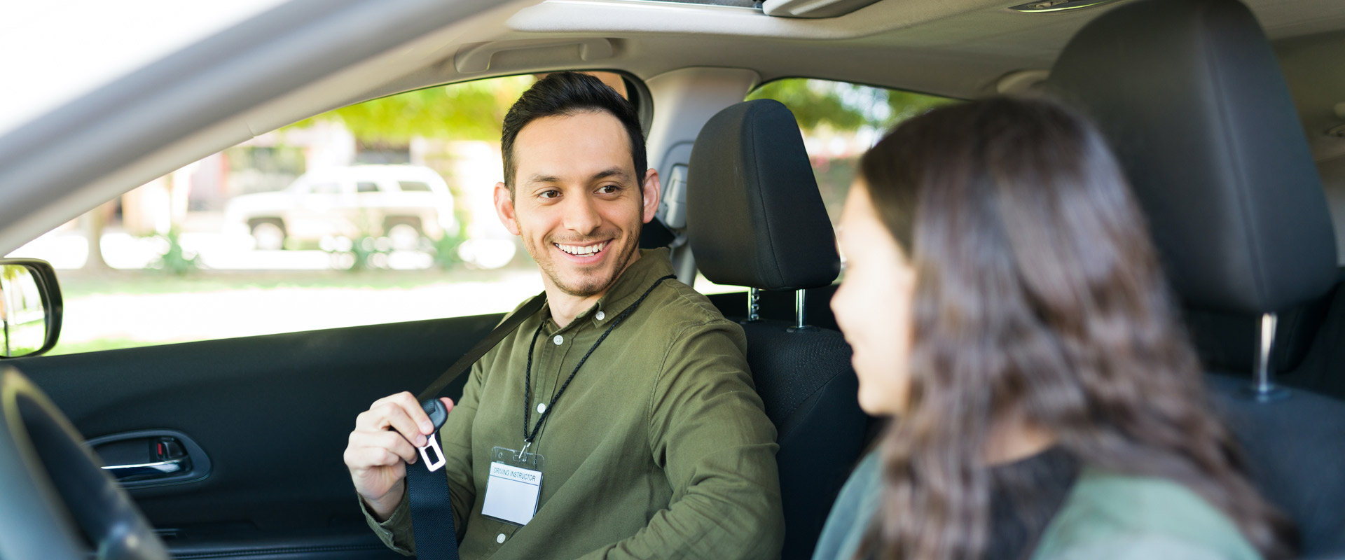 Student driver with instructor